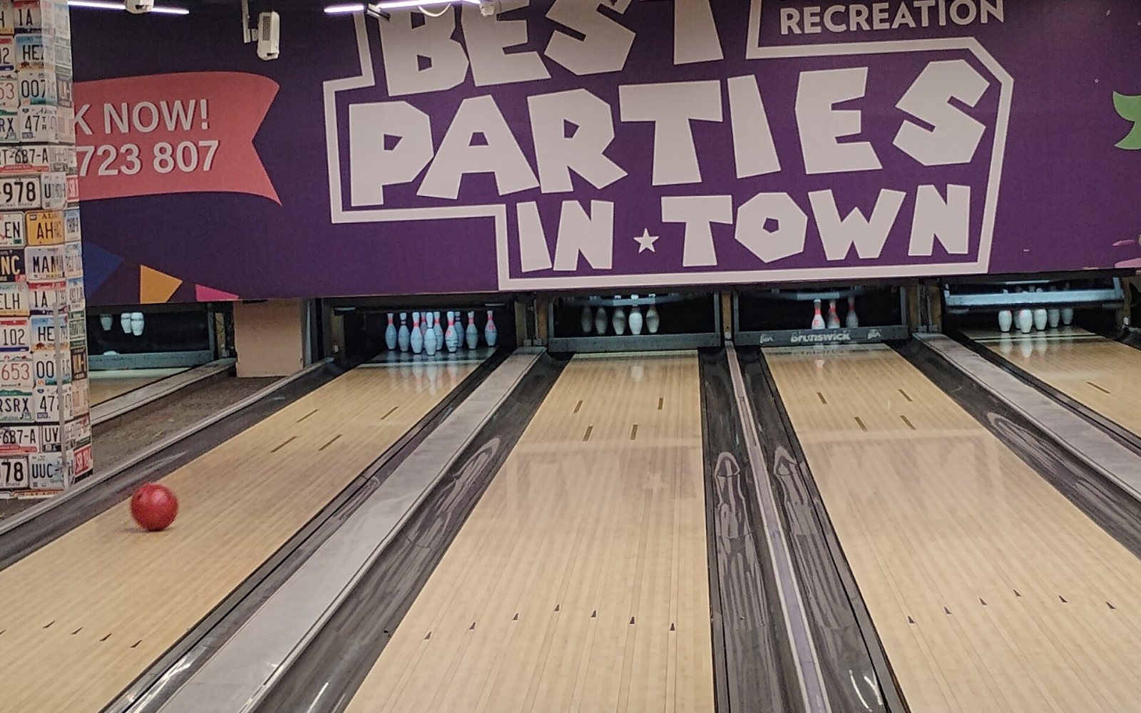 Bowling pins being knocked down