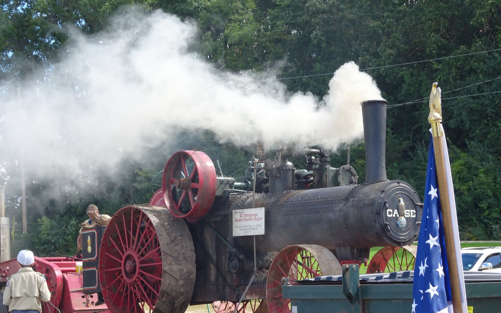 Shoppers browsing an outdoor antique show