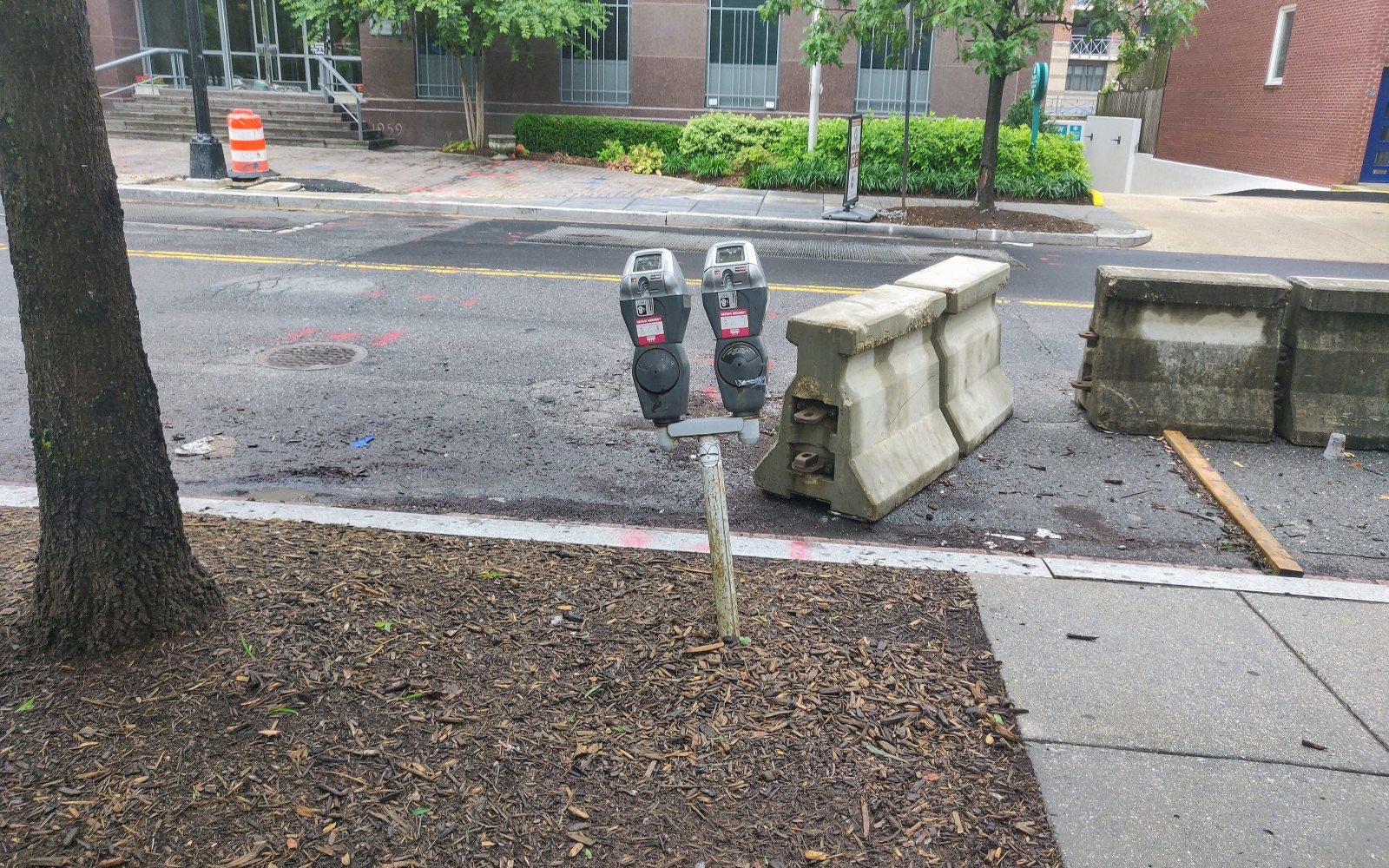 A parking meter beside a street