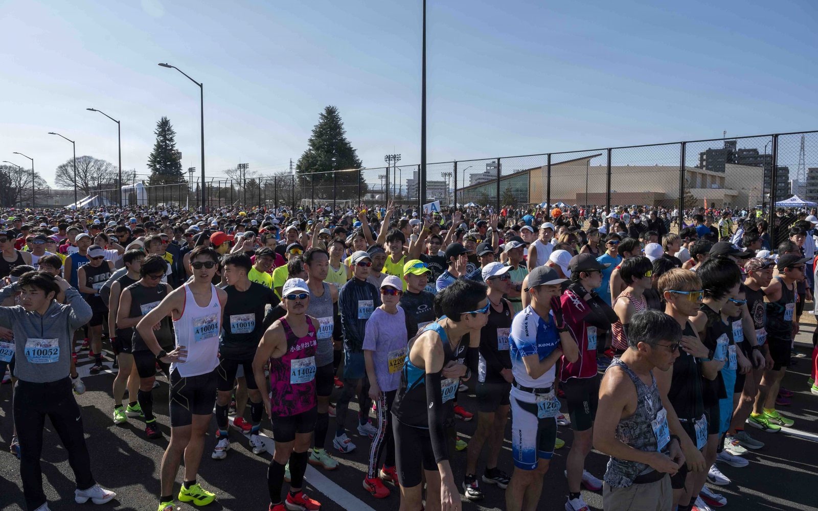 Runners at the start of a community road race