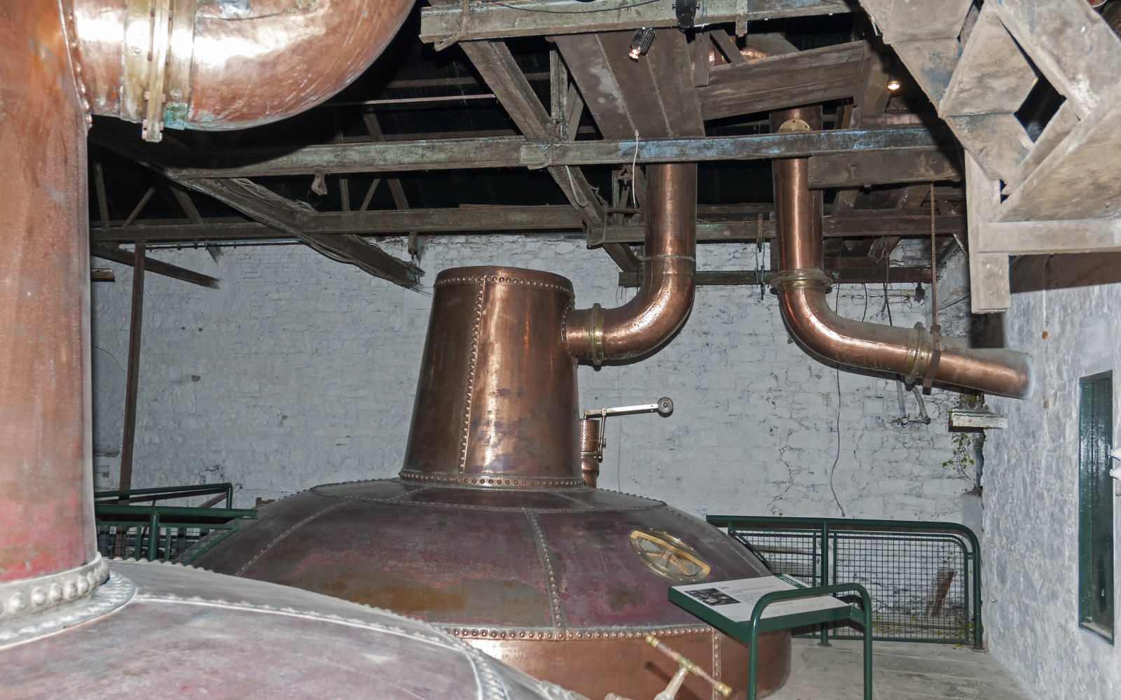 Copper stills inside a craft distillery