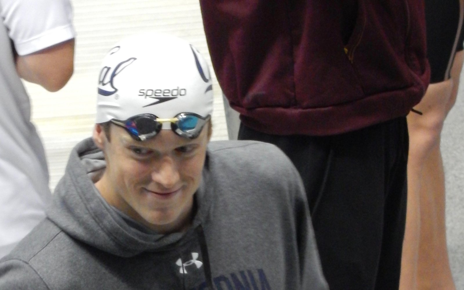 Swimmer competing in a pool lane