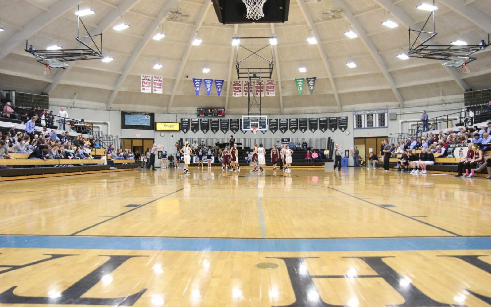 High school basketball game in a gym