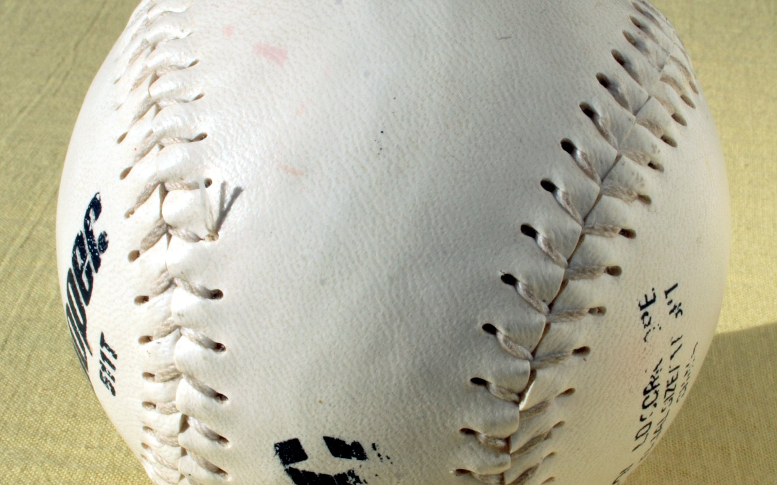 Softball batter swinging